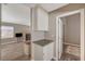 Hallway with built-in cabinets and granite countertop at 9612 World Cup Dr, Las Vegas, NV 89117