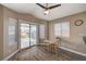 Bright kitchen nook with wood-look floors and access to backyard at 9612 World Cup Dr, Las Vegas, NV 89117