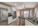 Kitchen with stainless steel appliances and granite countertops at 9612 World Cup Dr, Las Vegas, NV 89117