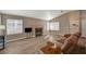 Living room with fireplace and wood-look floors at 9612 World Cup Dr, Las Vegas, NV 89117