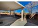 Covered patio with gravel landscaping and lighting at 9612 World Cup Dr, Las Vegas, NV 89117