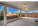 Covered patio with raised garden beds and gravel at 9612 World Cup Dr, Las Vegas, NV 89117