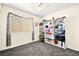 Bright bedroom with double door closet and grey carpet at 9700 Port Orange Ln, Las Vegas, NV 89134