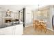 Kitchen nook with a small table and chairs, adjacent to the kitchen at 9700 Port Orange Ln, Las Vegas, NV 89134