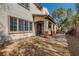 Spacious backyard with gravel and covered patio at 9802 Twin Mill St, Las Vegas, NV 89178