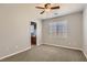 Bedroom with ceiling fan and double-door closet at 9802 Twin Mill St, Las Vegas, NV 89178