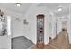 Inviting entryway with hardwood floors and display cabinet at 1021 Bourbon St, Pahrump, NV 89048