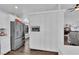 Stainless steel refrigerator in kitchen with white cabinets at 1021 Bourbon St, Pahrump, NV 89048