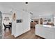 Kitchen boasts ample cabinetry and views into the adjacent living room at 1021 Bourbon St, Pahrump, NV 89048