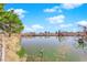 Calm lake with lush vegetation and blue sky at 1021 Bourbon St, Pahrump, NV 89048