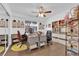 Home office with built-in shelving and wood flooring at 1021 Bourbon St, Pahrump, NV 89048