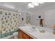 Adorable frog-themed bathroom with tub and vanity at 10350 Blue Ginger Dr, Las Vegas, NV 89135