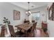 Formal dining room with hardwood floors and a chandelier at 10350 Blue Ginger Dr, Las Vegas, NV 89135