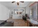 Home office with desk, chair, and view to kitchen area at 10350 Blue Ginger Dr, Las Vegas, NV 89135