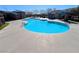 Large community swimming pool perfect for recreation, offering a relaxing lifestyle and a place to cool off at 10350 Blue Ginger Dr, Las Vegas, NV 89135
