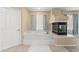 Bathroom features a large soaking tub and fireplace at 10825 Bernini Dr, Las Vegas, NV 89141