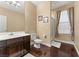 Clean bathroom with shower, toilet and dark wood vanity at 10825 Bernini Dr, Las Vegas, NV 89141