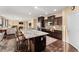 Spacious kitchen with granite countertops, stainless steel appliances, and dark wood cabinetry at 10825 Bernini Dr, Las Vegas, NV 89141