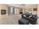 Main bedroom suite with a fireplace and access to balcony at 10825 Bernini Dr, Las Vegas, NV 89141