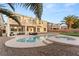 Beautiful pool and spa surrounded by a relaxing patio at 10825 Bernini Dr, Las Vegas, NV 89141
