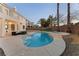 Inviting backyard oasis featuring a pool and spa at 10825 Bernini Dr, Las Vegas, NV 89141