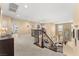 Upstairs hallway overlooking the living area with a staircase at 10825 Bernini Dr, Las Vegas, NV 89141