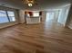 Open living area with light flooring and a view of the kitchen at 11660 Fiorello Ct, Las Vegas, NV 89183