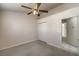 Spacious bedroom with double door closet and ceiling fan at 1245 Heyer St, Overton, NV 89040