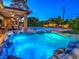 Relaxing hot tub with blue lighting, near patio and pool at 1760 Westwind Rd, Las Vegas, NV 89146