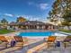 Inviting pool with lounge chairs and a large backyard at 1760 Westwind Rd, Las Vegas, NV 89146