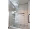 Modern shower with white subway tiles and a glass enclosure at 1760 Westwind Rd, Las Vegas, NV 89146