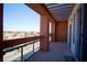 Spacious balcony with glass railings and an open trellis covering at 23 E Agate Ave # 506, Las Vegas, NV 89123