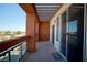 Spacious balcony with glass railings and an open trellis covering at 23 E Agate Ave # 506, Las Vegas, NV 89123
