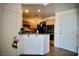 A cozy kitchen with black appliances and ample cabinet space at 23 E Agate Ave # 506, Las Vegas, NV 89123