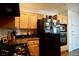 Kitchen featuring granite counters and wooden cabinets at 23 E Agate Ave # 506, Las Vegas, NV 89123