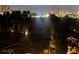 An expansive night view of the city skyline and surrounding homes at 23 E Agate Ave # 506, Las Vegas, NV 89123