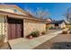 View of the front entrance with decorative gate at 2373 Cardiff Ln # A, Las Vegas, NV 89108