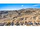 Aerial view of houses nestled against a backdrop of desert mountains at 2755 Sunken Ship St, Laughlin, NV 89029