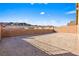 Spacious backyard with gravel and block wall at 2755 Sunken Ship St, Laughlin, NV 89029
