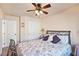 Bedroom with double bed, ceiling fan and double door closet at 2755 Sunken Ship St, Laughlin, NV 89029