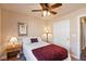 Bedroom with a full-size bed and ceiling fan at 2755 Sunken Ship St, Laughlin, NV 89029