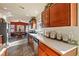 Kitchen with stainless steel appliances, ample counter space, and rich wood cabinets at 2755 Sunken Ship St, Laughlin, NV 89029