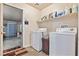 Laundry room with washer, dryer, and garage access at 2755 Sunken Ship St, Laughlin, NV 89029