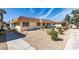 Single story home with landscaped yard and walkway at 2764 Heritage Ct, Las Vegas, NV 89121