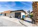 Attached garage with driveway and walkway at 2764 Heritage Ct, Las Vegas, NV 89121