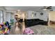 Spacious living room with fireplace and large sectional sofa at 2764 Heritage Ct, Las Vegas, NV 89121