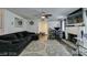 Living room with fireplace, ceiling fan, and large sectional at 2764 Heritage Ct, Las Vegas, NV 89121