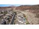 Aerial view of neighborhood nestled in desert landscape at 30 Hilltop Crest St, Henderson, NV 89011