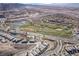 Aerial view of a golf course and lake community at 30 Hilltop Crest St, Henderson, NV 89011