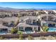 Aerial view of home with pool and landscaped backyard at 30 Hilltop Crest St, Henderson, NV 89011